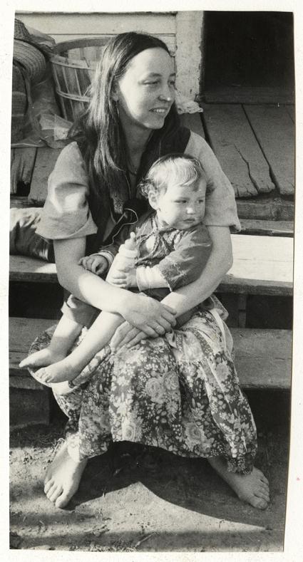 Woman with child on lap 2